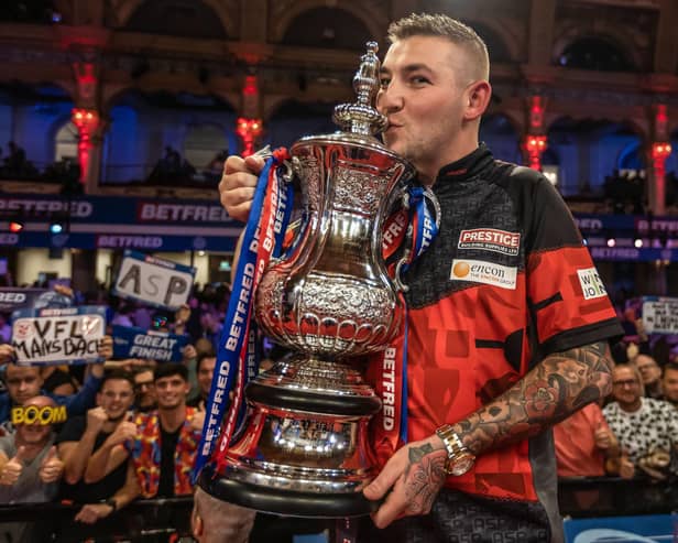 Nathan Aspinall celebrates winning the Betfred World Matchplay final at Blackpool's Winter Gardens last year. Picture: PDC