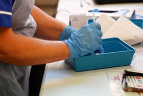 A nurse preparing a dose of a Covid-19 vaccine. Picture: Paul Ellis/Getty Images.
