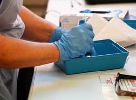 A nurse preparing a dose of a Covid-19 vaccine. Picture: Paul Ellis/Getty Images.