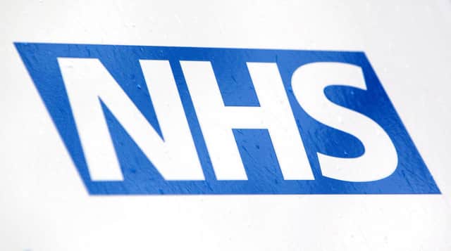 File photo dated 23/04/12 of an NHS logo, as NHS England is urging people to use its online service in a bid to reduce "record" demand on accident and emergency departments.