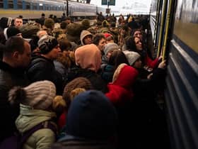 Refugees struggle to board a train at Lviv's main station, Ukraine, on March 9, 2022 Picture: Gustavo Basso/NurPhoto via Getty Images
