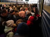 Refugees struggle to board a train at Lviv's main station, Ukraine, on March 9, 2022 Picture: Gustavo Basso/NurPhoto via Getty Images