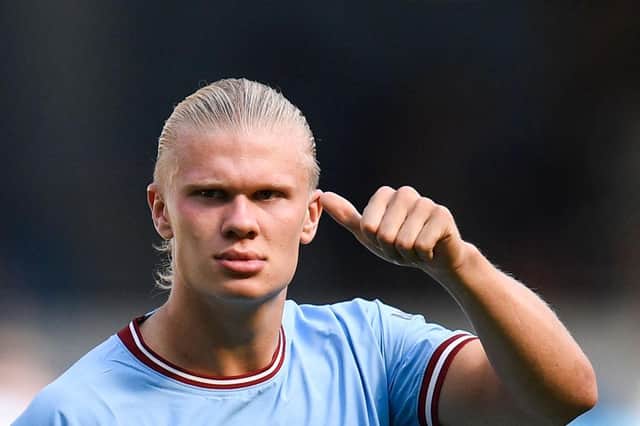 Manchester City's Norwegian striker Erling Haaland celebrates at the end of the English Premier League football match between Manchester City and Bournemouth at the Etihad Stadium in Manchester, north west England, on August 13, 2022. (Photo by OLI SCARFF/AFP via Getty Images)