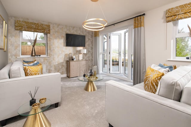 BM - The living room inside a show home at Barratt Homes' Midshire Meadow
