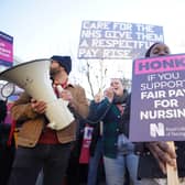 Members of the Royal College of Nursing (RCN) on the picket line outside St Thomas' Hospital, central London. Continued strike action plus winter pressures are jeopardising the ability of the NHS to break out of a "vicious cycle", a health leader has said. Issue date: Wednesday January 18, 2023.