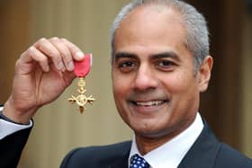 George Alagiah at Buckingham Palace after collecting his OBE from the Queen.