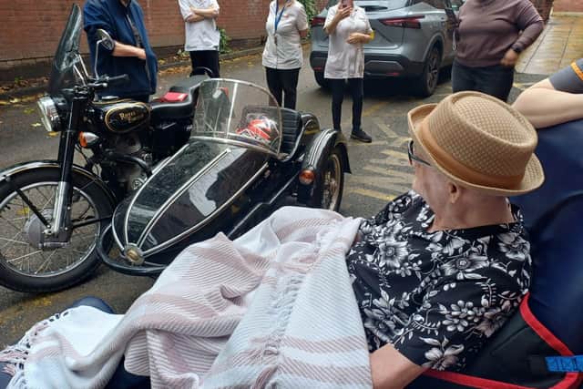 Resident Michael Murphy at HC-One’s Newlands Care Home with the Belle Vue Aces Supporters Club