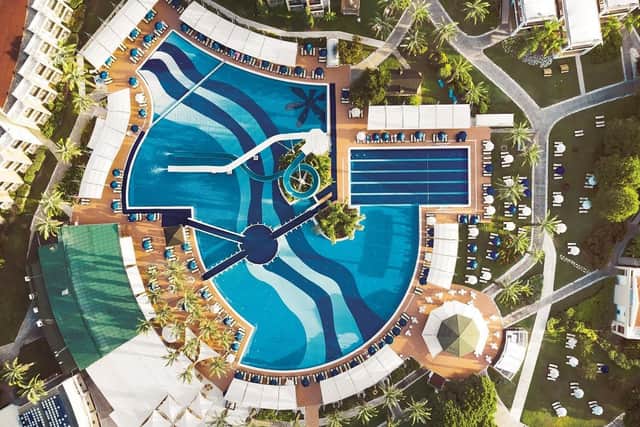 An aerial view of the main pool and pool restaurant area