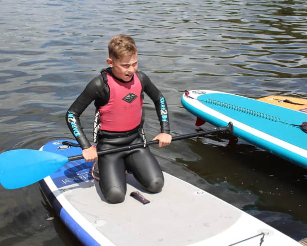 Beech Hall Pupil Archie Davies, Y6, learning to paddleboard