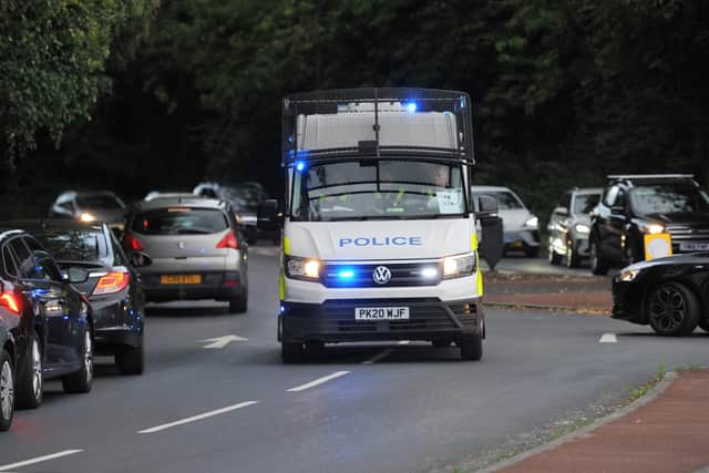 Police on the scene at the Support for Wigan Arrivals Project last week amid fears of more rioting.

