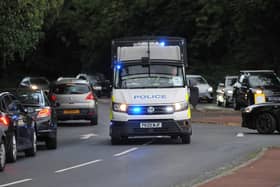 Police on the scene at the Support for Wigan Arrivals Project last week amid fears of more rioting.
