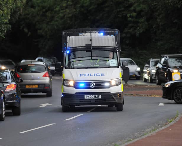 Police on the scene at the Support for Wigan Arrivals Project last week amid fears of more rioting.