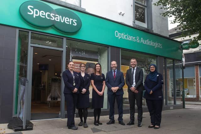 Jonathan Reynolds MP with the Specsavers Hyde team