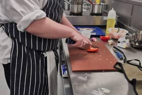 Ben practising his culinary skills
