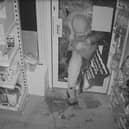 Thug breaks into pharmacy and drops bag of stolen goods