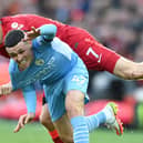 Liverpool’s James Milner was lucky not to give away a penalty following a collision with Man City’s Phil Foden in the 2-2 draw. Picture: Michael Regan/Getty Images