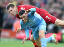 Liverpool’s James Milner was lucky not to give away a penalty following a collision with Man City’s Phil Foden in the 2-2 draw. Picture: Michael Regan/Getty Images