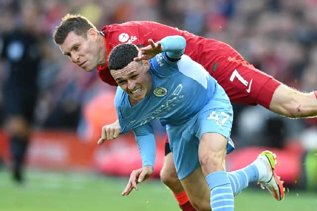 Liverpool’s James Milner was lucky not to give away a penalty following a collision with Man City’s Phil Foden in the 2-2 draw. Picture: Michael Regan/Getty Images