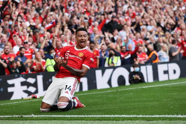 MANCHESTER, ENGLAND - SEPTEMBER 11: Jesse Lingard of Manchester United celebrates after scoring their side's fourth goal during the Premier League match between Manchester United and Newcastle United at Old Trafford on September 11, 2021 in Manchester, England. (Photo by Clive Brunskill/Getty Images)