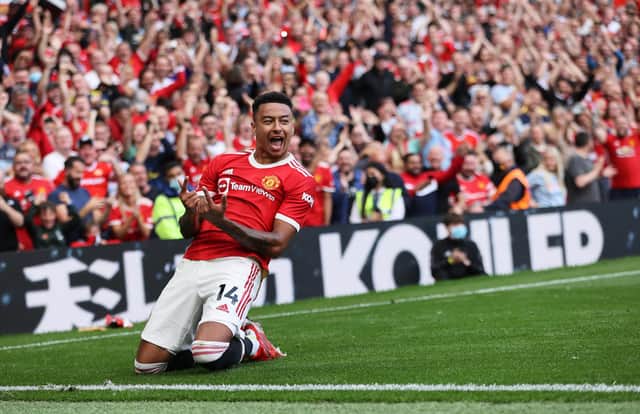 MANCHESTER, ENGLAND - SEPTEMBER 11: Jesse Lingard of Manchester United celebrates after scoring their side's fourth goal during the Premier League match between Manchester United and Newcastle United at Old Trafford on September 11, 2021 in Manchester, England. (Photo by Clive Brunskill/Getty Images)