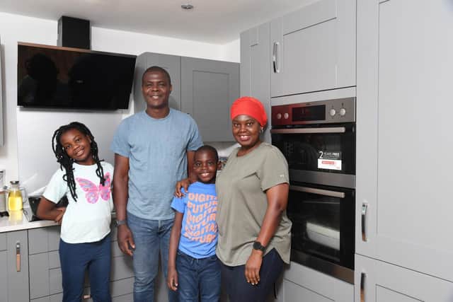 Sabith Raji-Banjoko and Banjoko Oluwaseun with their children in their Taylor Wimpey home