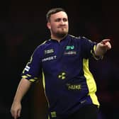 Luke Littler of England celebrates during the Final against Michael van Gerwen of The Netherlands during day sixteen of the 2024/25 Paddy Power World Darts Championship at Alexandra Palace (Picture: James Fearn/Getty Images)