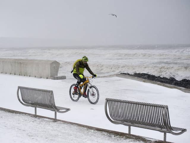 A brave cyclist takes a trip along the Prom in Kirkcaldy during the ‘Beast from the East’ weather in February 2018.