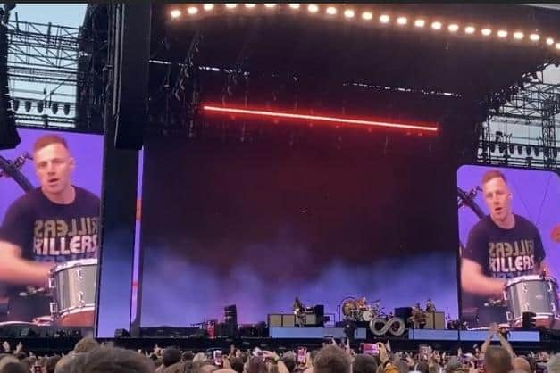 Kyle Grieve on the big screens drumming for The Killers at Falkirk Stadium