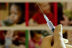 A nurse handles a syringe at a medical centre in Ashford, Kent, similar to those which will be used for a new combined jab for babies. The vaccination will protect children against Diptheria, Tetanus, Whooping Cough, Hib and Polio and will be administered to babies over two-months-old later this year. Plans for a shake-up of the vaccine regime for babies are being formally unveiled by senior health officials today. But health campaigners and politicians have warned the Government that it risks a repeat of the MMR controversy unless more reassurances are given about the safety of a new five-in-one immunisation jab. The Government's plans for a combined vaccination emerged over the weekend, when the Department of Health also confirmed that mercury is to be removed from the whooping cough vaccine. 10/09/04: There is no evidence to support a link between the controversial MMR jab and the development of autism in children, researchers said Friday September 10, 2004. Concern about a reported link between the triple vaccine and the disorder has led to a drop in the number of parents getting their children vaccinated against measles, mumps and rubella in the UK.   *07/12/04: Immunisation against infectious disease has saved more lives than any other public health intervention in Irish history, apart from providing clean water, it is claimed. Minister of State Tim O'Malley urged parents to ensure their children were protected against infectious diseases. 