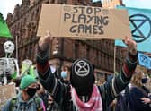 Climate activists march through the streets of Glasgow