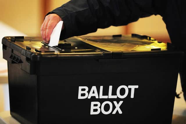 A voter placing a ballot paper in the ballot box. PIC: Rui Vieira/PA Wire