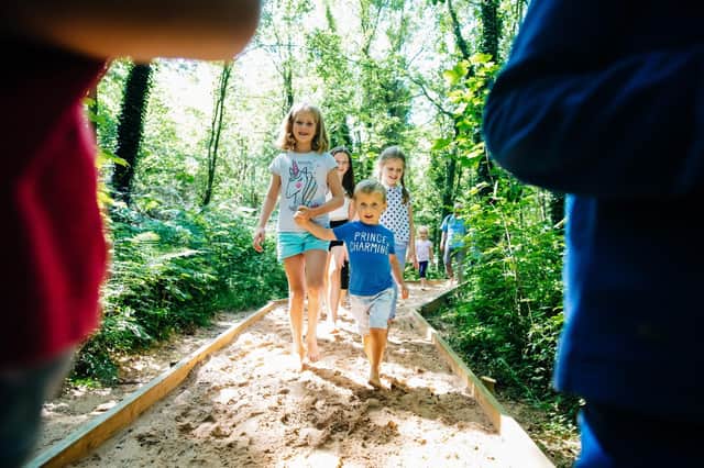 Children exploring the Barefoot Trail