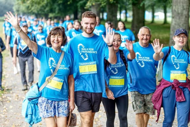 Fundraisers taking part in Walk for Parkinson’s at Marbury Country Park in Cheshire, last year.