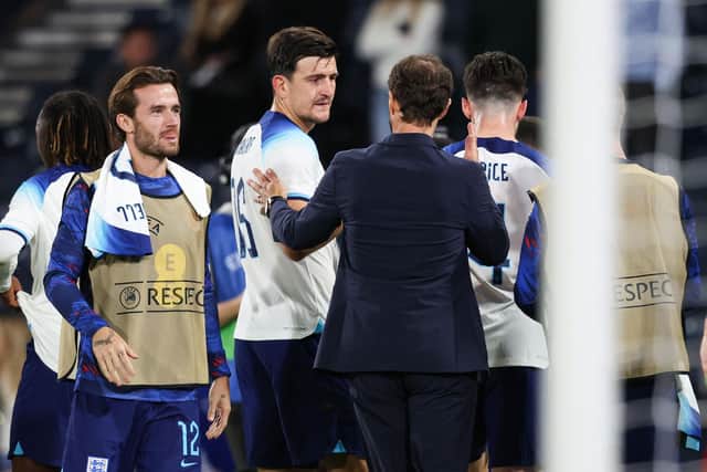 England manager Gareth Southgate speaks with Harry Maguire at full time following the win over Scotland.