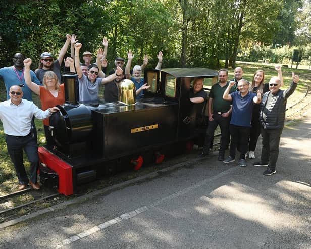 Celebrations as plans to restore Haigh Woodland Railway are back on track, thanks to Wigan Council investment. Pictured are dedicated volunteers who form the Haigh Woodland Supporter's Association (HWRSA) with members of Wigan Council and ward councillors at Haigh Woodland Park.