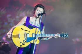 Harry Styles is regularly seen in a Manchester United shirt. 