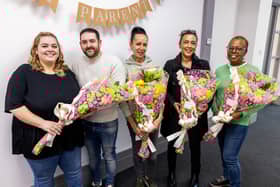 Foster carers in Manchester receiving flowers and a special ‘Every Parent Day’ card from Swiis Foster Care