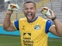 First men’s team captain of the Leeds Rhinos, Kruise Leeming, ‘try-s and tastes’ new Deliveroo x Hooyah Burgers exclusive Leeds Rhinos burger ahead of its launch on National Burger Day, August. 25 (photo: Doug Jackson/PinPep)