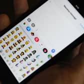 Apple could bring AI generated emojis to iPhones! (Picture: Tengku Bahar/AFP via Getty Images)