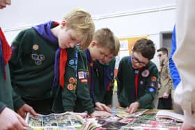 Cub Scouts read through comics from 2000.