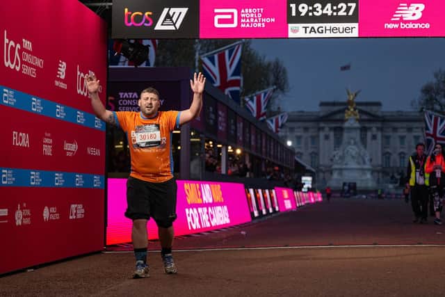 The final participant to finish The TCS London Marathon, Mav Durnin, crosses the finish line on The Mall on SundayPhoto: Jon Buckle for London Marathon EventsFor further information: media@londonmarathonevents.co.uk