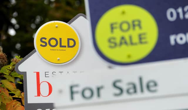 File photo dated 14/10/14 of sold and for sale signs. House prices across the UK are expected to increase by 4 percent this year, according to a property group's forecasts. Issue date: Tuesday March 9, 2021.