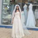 Maya Shah, modelling one of the Marie Curie wedding dresses on sale at their first ever Wedding stor
