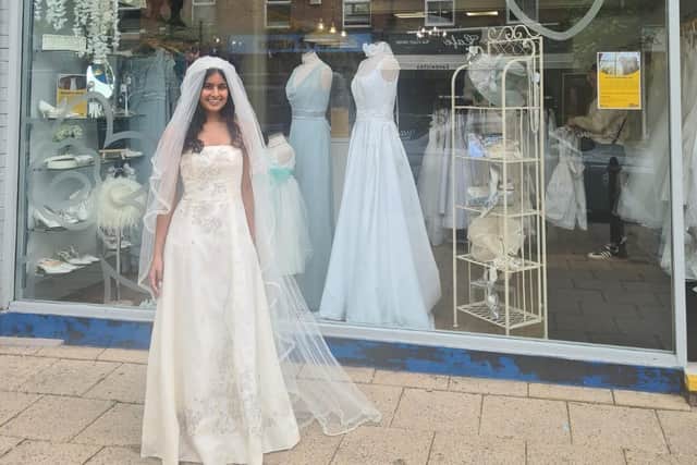 Maya Shah, modelling one of the Marie Curie wedding dresses on sale at their first ever Wedding stor