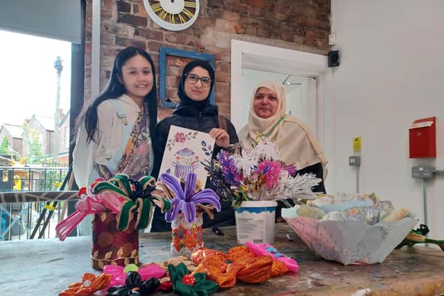 Artist Hathaikan Kongaunruan with Iqra Tariq and Gulnaz Tahir from OT Creative Space