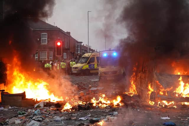 Lies, rumours and disinformation spread on social media have played a key part in recent violent riots, in which police and others have come under attack by members of the far-right (Picture: Getty Images)