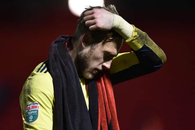 Woolston was a member of United’s Under-23 team before retiring from playing. Credit: Getty.
