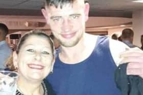 Christopher Hughes with his mum Susan. Credit: family/GMP 