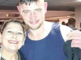 Christopher Hughes with his mum Susan. Credit: family/GMP 
