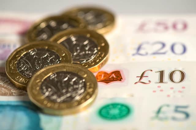 File photo dated 26/01/18 of money. Football clubs, retailers, hairdressers and cleaning contractors are among 191 businesses "named and shamed" by the Government for breaking the minimum wage law. A total of £2.1 million was found to be owed to more than 34,000 workers following investigations by Her Majesty's Revenue and Customs dating back to 2011. Issue date: Thursday August 5, 2021.